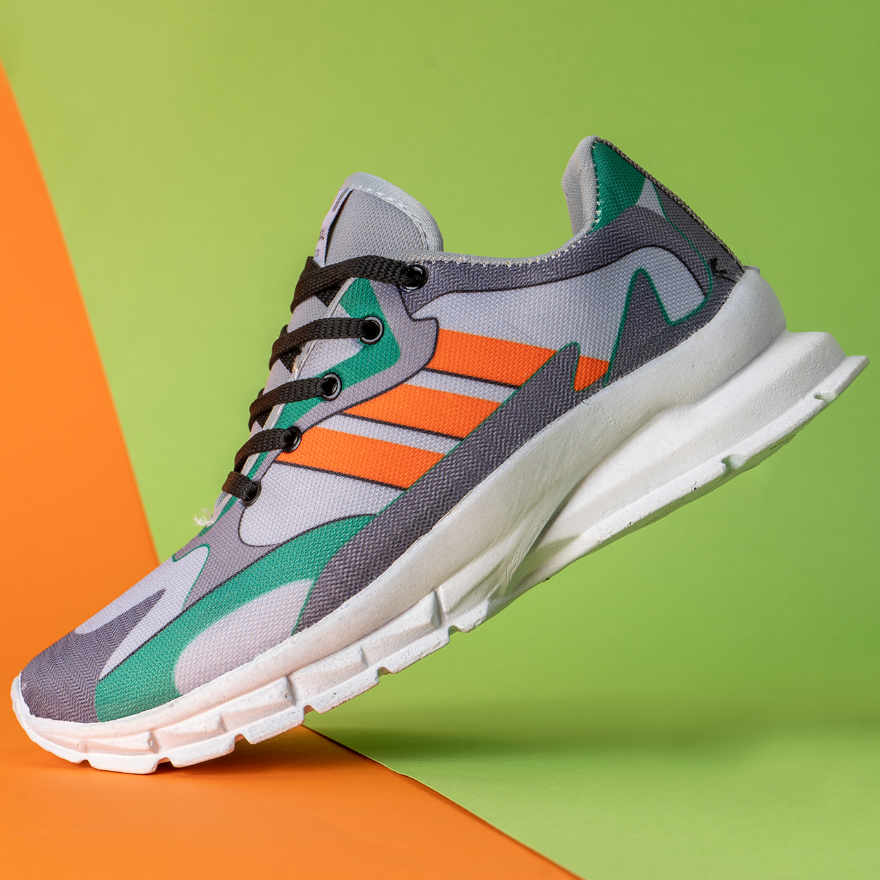 کفش ورزشی Adidas مردانه نارنجی مدل Tacha