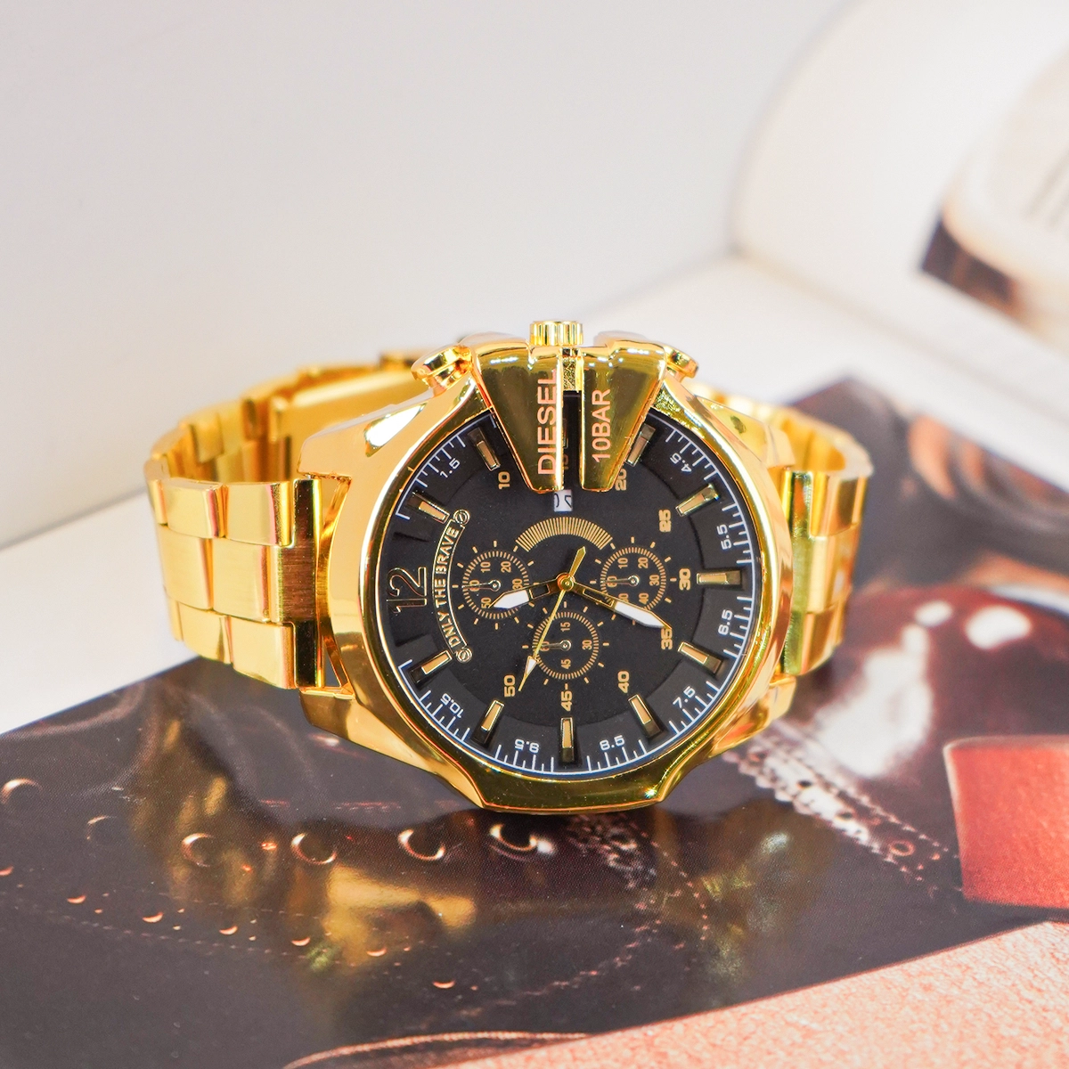 ساعت مچی DIESEL مردانه طلایی صفحه مشکی مدل U700