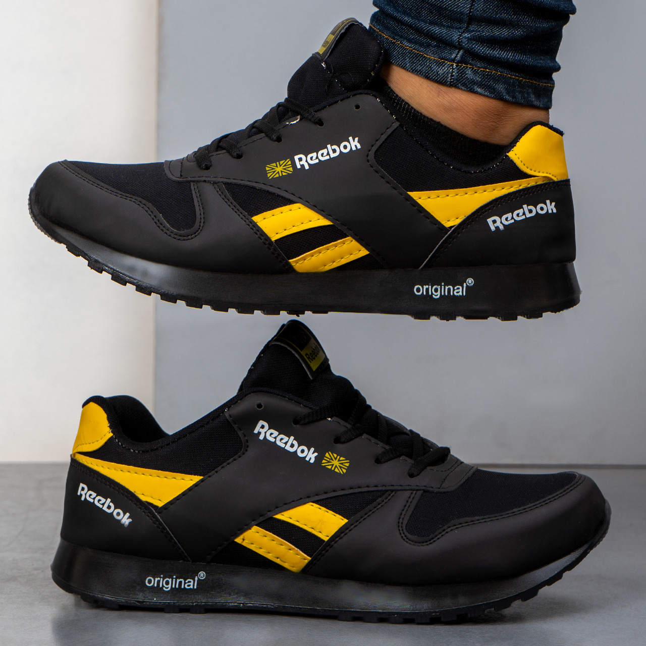 کفش ورزشی Reebok مشکی زرد مردانه مدلRako