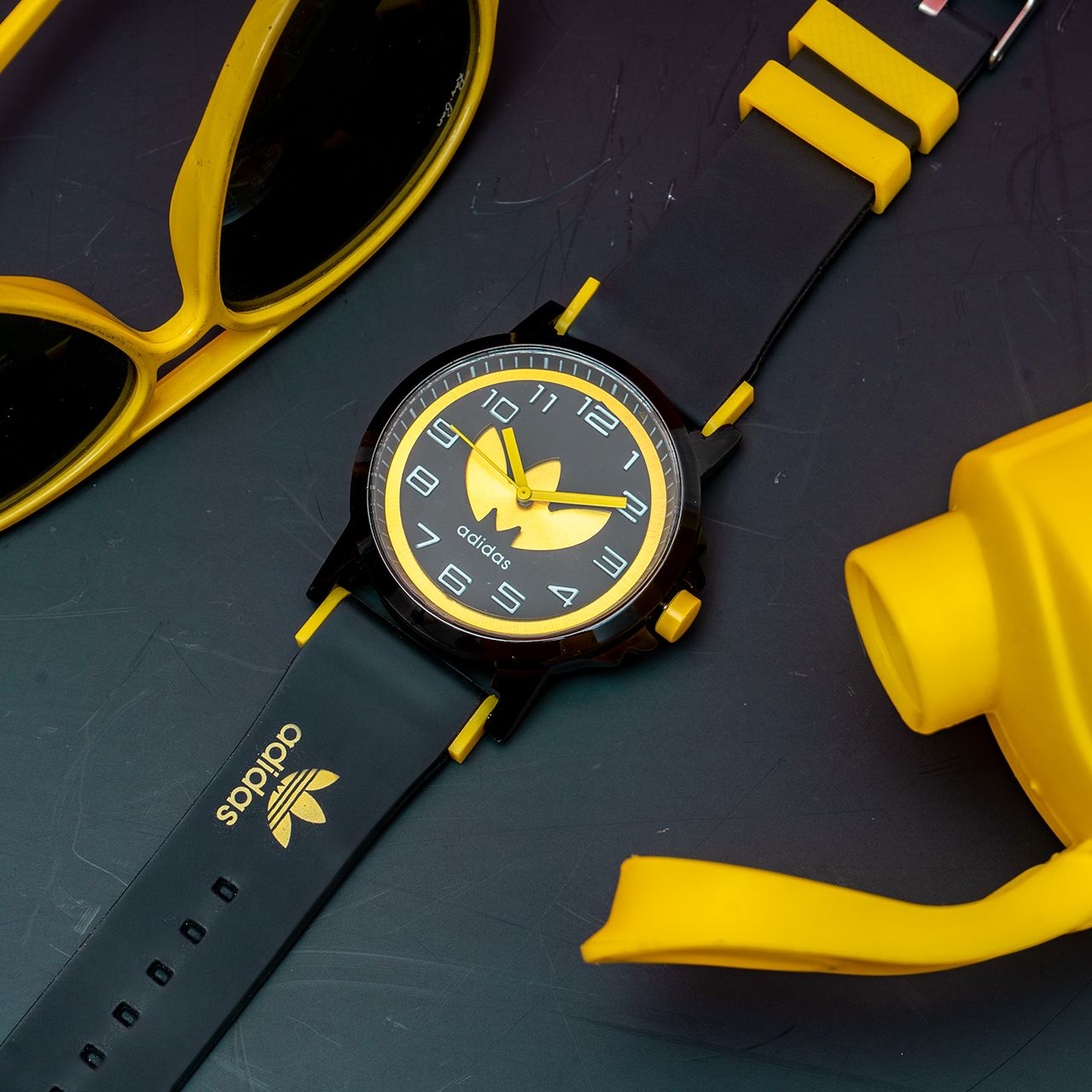 ساعت مچی آدیداس مشکی زرد مدل E51