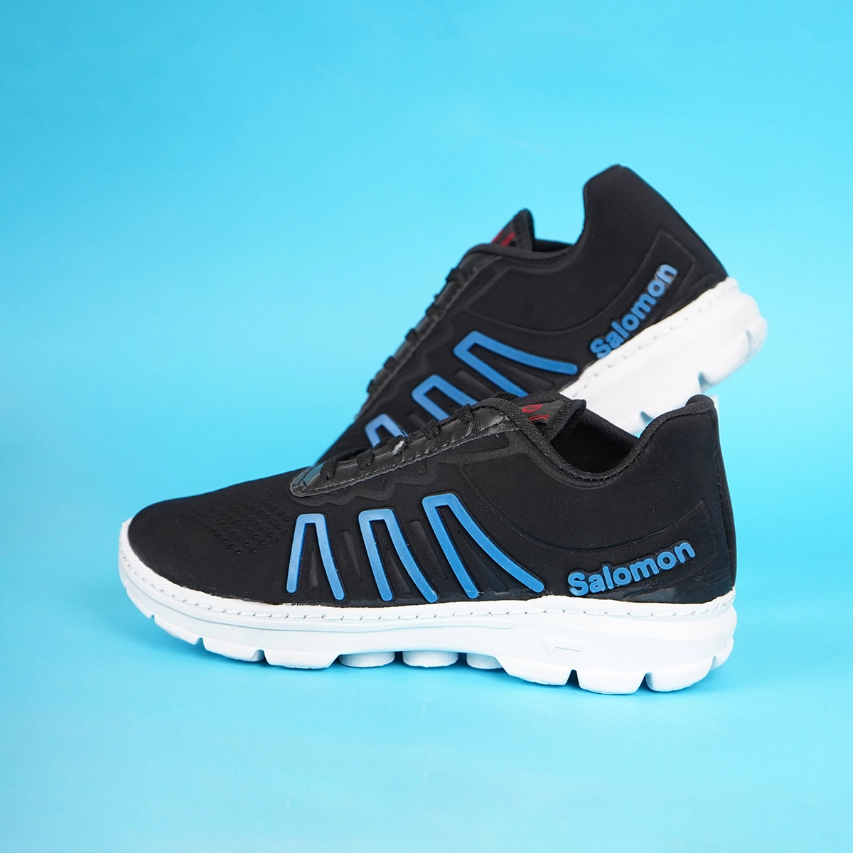 کفش ورزشی مردانه سالامون مشکی آبی مدل U200