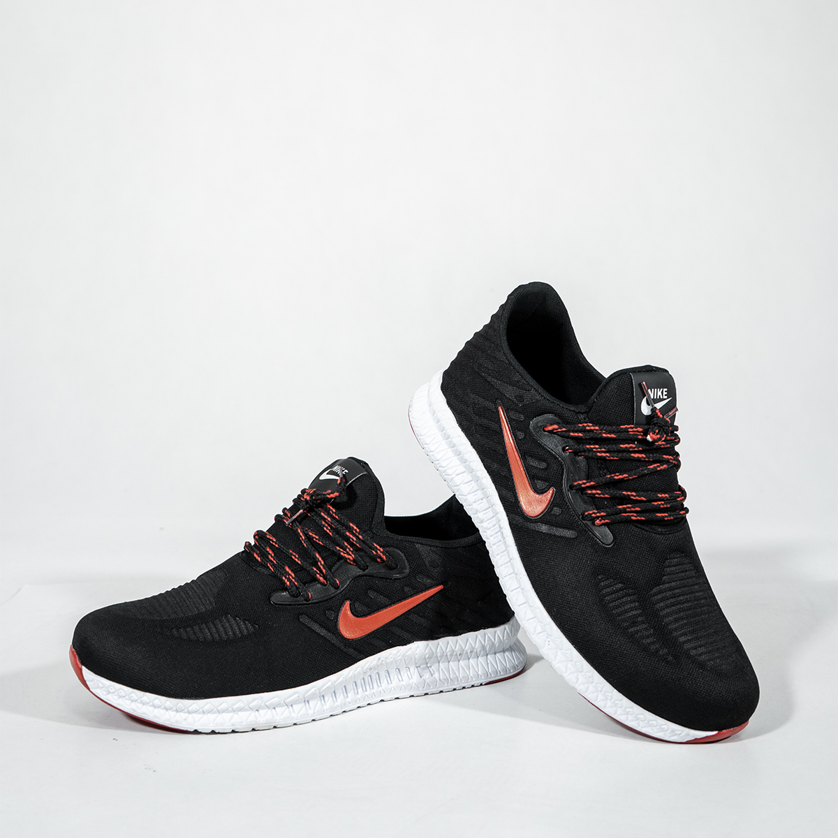 کفش ورزشی Nike مردانه مشکی قرمز مدل Roham